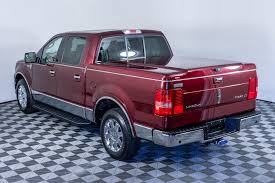 Image result for Dark Toreador Red 2006 Lincoln