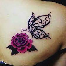 This thorough simplification makes for a minimalistic, elegant tattoo. Pink Rose And Black Butterfly Tattoo