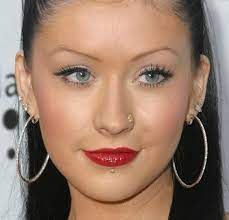legend s tattoo and piercing collection christina aguilera celebrity piercings christina aguilera piercing