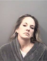 Woman charged with failing to report death of boyfriend for three days