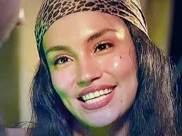 Why do men find her attractive?