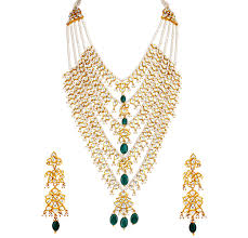 Tanishq Pays Tribute To Rajputana Tradition With The Padmavati Collection Bringing You A Stunning Rendition Of Royal Jewelry Gold Long Necklace Indian Jewelry