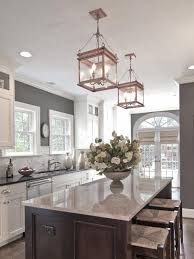 White Cabinets Grey Walls Neutral Backslash Dark Island Design By Carolina Design Associates Diy Net Cottage Style Kitchen Kitchen Styling Kitchen Remodel