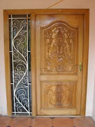 Https Upload Wikimedia Org Wikipedia Commons 9 93 An Ornamental Door In Tamil Nadu Jpg Wooden Door Design Door Handle Design Main Door Design