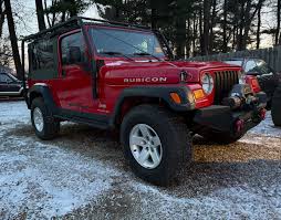 Image result for Flame Red 2005 Jeep