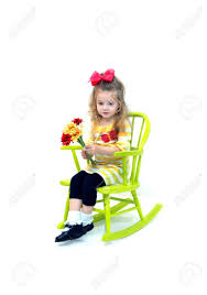 Buy children's bedroom rocking chairs and get the best deals at the lowest prices on ebay! Little Girl Sits In A Bright Green Painted Wooden Rocking Chair Stock Photo Picture And Royalty Free Image Image 15111187