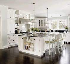 These are pictures of her current kitchen and living room. Why White Kitchen Cabinets Make The Most Timeless Kitchen White Kitchens White Modern Kitchen Timeless Kitchen Black Kitchens