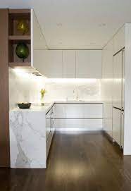 These modern kitchens will grace your home with contemporary style and marble countertops and backsplash lend a luxurious feel to this modern design. 17 Stylish Marble Kitchen Designs For Every Contemporary Home Kitchen Design Small Modern Kitchen Design Kitchen Remodel Small