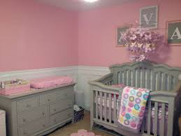 Just before our daughter was born we remodeled one of the bedrooms that would become the nursery. Baby Nursery Pink And Gray Like The Chair Rail With Pink Above Possibly Do Bottom Gray With Light Pink Top Baby Girl Bedroom Baby Girl Room Baby Nursery