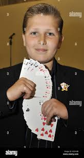 11-year-old magician Lewis Fuller at London Zoo where she was enjoying the  Little Star Awards party held by Cancer Research UK and TK Maxx Stock Photo 