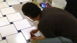 Installing ceramic tile on concrete floor video. How To Tile A Bathroom Floor Video Hgtv