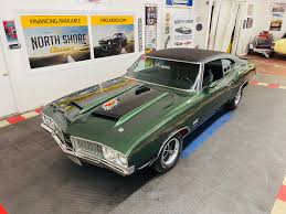 Image result for Forest Green 1942 Oldsmobile