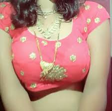 Why do some females wearing a saree, wear a sheer blouse, making ...