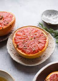 Broiled Grapefruit With Maple Syrup Rosemary And Sea Salt Salted Plains Recipe Broiled Grapefruit Grapefruit Recipes Grapefruit