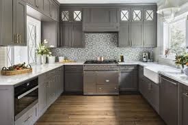 Med Gray Cabinets Brass Hardware Patterned Tile Splash Kitchen Trends Kitchen Remodel Kitchen Remodel Trends