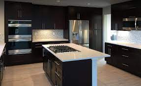 The cabinet interiors have a natural finish. Espresso Shaker Kitchen Cabinets Denver Custom Cabinetry Stone International