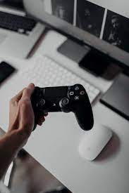 Maybe you would like to learn more about one of these? Hd Wallpaper Person Holding Sony Playstation Dualshock 4 Controller Workspace Wallpaper Flare