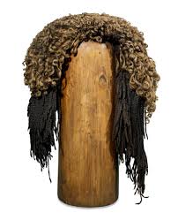 The clothing was adorned by fabulous jewelry, sashes and aprons and by the addition of decorative and highly fashionable wigs. Wig British Museum