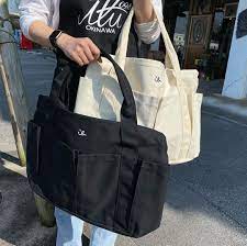 ilu098 アイルゼロナインエイト on instagram coming tomorrow ポケット沢山な使い勝手良き アイルの最新バッグが登場です 1番大きな中央ポケットは中身を隠せるファスナー付き 633 ilu big pocket bag 5 500 ナチュラ バッグ ブラック ファスナー