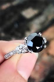 Ara vartanian ring set with an inverted black diamond and smaller black diamonds on a white gold band ($7,600). 24 Unique Black Diamond Engagement Rings Oh So Perfect Proposal