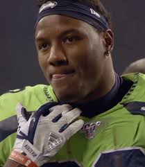 What Is Chris Carson Doing Now