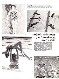 dolphin swimmers perform dance, water style