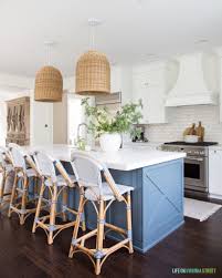 The kitchen island features five storage drawers and two spacious cabinets, making kitchen organization a breeze. Coastal Kitchen Reveal Life On Virginia Street