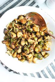 Sweet And Spicy Brussels Sprouts And Cauliflower Happy Healthy Mama In 2020 Brussel Sprouts Sprout Recipes Vegan Brussel Sprout Recipes