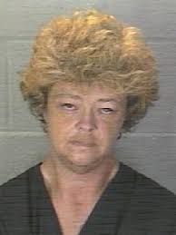 Four charged after probation officer's search at North 8th Street home