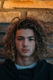 40 Hairstyles For Thick Hair Men S Stylendesigns Long Curly Hair Men Curly Hair Men Long Hair Styles Men