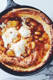 Bananas Foster Dutch Baby Easy Decadent Puffed Pancake With Caramelized Bananas Recipe Bananas Foster Caramelized Bananas Baby Food Recipes
