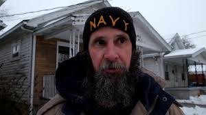 Husband charged in South Toledo woman's death