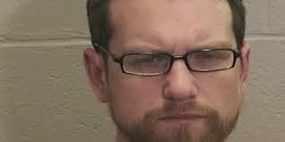 UW critic Jeff Decker charged with child abuse