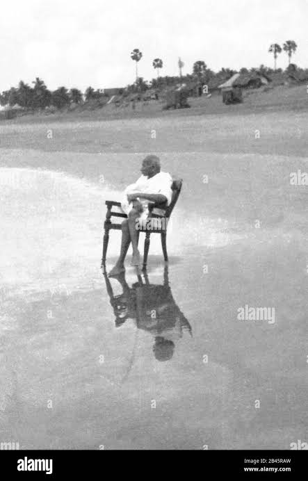 Mahatma Gandhi sitting on chair at Juhu Beach, Bombay, Mumbai, Maharashtra, India, Asia, May 1944, old vintage 1900s picture Stock Photo - Alamy