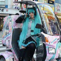 Hatsune Miku In An Electric Dominos Car Best Cosplay Miku Anime Car