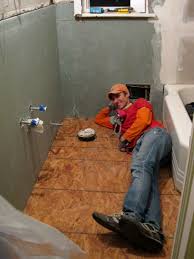 How to install a subfloor in a bathroom.floating bathroom vanity with vessel sink? Hanging Cement Board Drywall Fixing The Subfloor Young House Love
