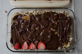 Chocolate pudding, whipping cream, pistachio pudding, strawberry preserves, coconut flakes, cheese colored chocolate, maraschino cherries. Dessert 7 Layer Dip Sweetens Up Your Super Bowl Party Recipe Desserts Chocolate Pie With Pudding Superbowl Desserts