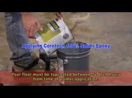 applying corotech 100 solids epoxy onto concrete