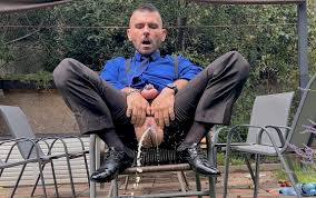 Suited men with locked dick is playing with his mancunt and pissing in  public in sheer socks watch online