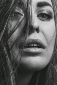 A close up of a woman's face photo