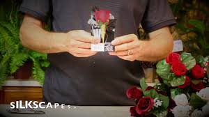 Silk flowers are found within bright red bushes at yujing terrace within liyue harbor and also near the wangshu inn. Silk Scapes Florists The Knot