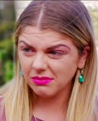 This is Aria and she is 7! She makes much grump face. 9th picture is what  makes her grump.