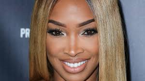 Malika Haqq looks stunning in bikini for Khloe Kardashian's Good American  brand