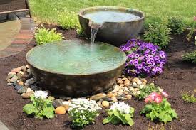 Add led lighting on the water fountain to illuminate the sheet of water as it comes out. Aquascape Spillway Bowls Create Unique Fountain Options Aquascape Inc Landscaping With Fountains Water Features In The Garden Garden Fountains