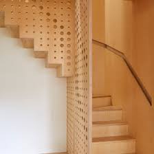 If you have a split level entry like us, you will also need a handrail on the lower set of stairs. R2 Studio Adds Hole Punched Staircase To Ash House In London