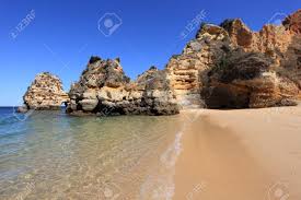 If you imagine portugal to be the face on the square profile of the iberian peninsula (as i always have), then sagres is the very point of its bearded chin. Strand An Der Algarve Kuste In Der Nahe Von Lagos Portugal Lizenzfreie Fotos Bilder Und Stock Fotografie Image 14373692