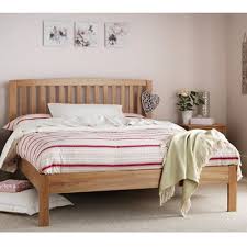 high quality low foot end bed frame made from solid oak attractive slatted headboard design waxed finish sizes small wooden bed frames bed frame wooden bed