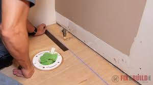Not only will you have a beautiful floor but it will also withstand spills or leaks and maintains a lifetime warranty in the process. How To Install Vinyl Plank Flooring In A Bathroom Fixthisbuildthat