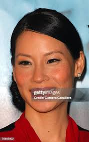 Babe Ruth lines a single to right field at League Park. The Yankees... News  Photo