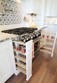 A pullout spice rack is a narrow shelf that includes a rail system mounted to a cabinet front. Built In Spice Racks Transitional Kitchen Uv Parade Of Homes